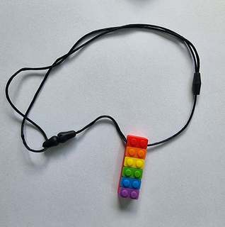 Sensory necklace - Rainbow Lego