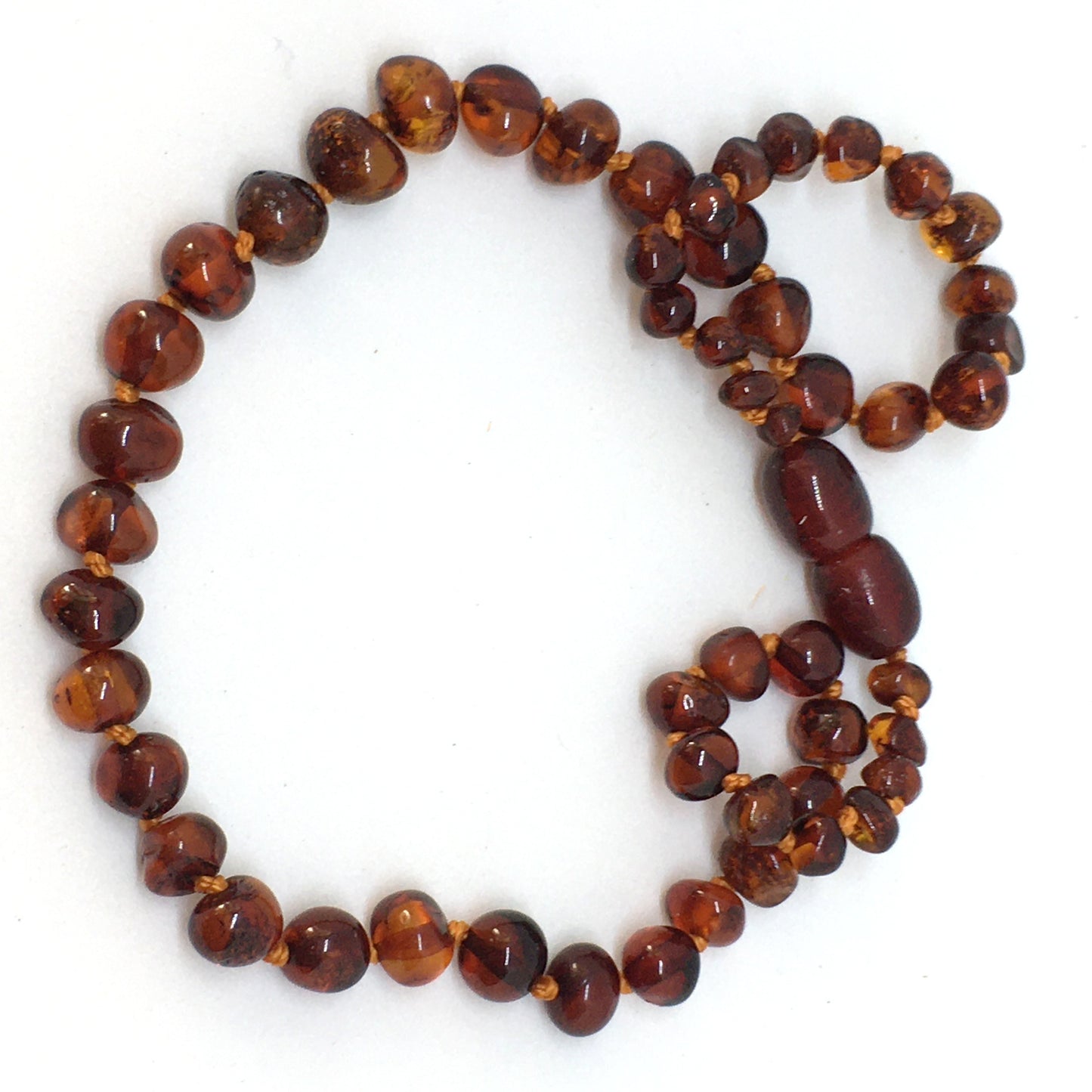 Child amber necklace - Cognac